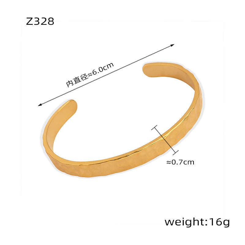 New simple personality niche design titanium steel gold-plated irregular bump hammer face opening bracelet women's jewelry wholesale