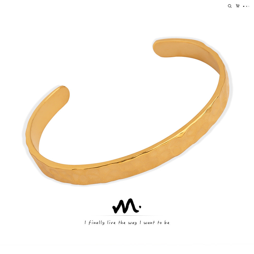 New simple personality niche design titanium steel gold-plated irregular bump hammer face opening bracelet women's jewelry wholesale