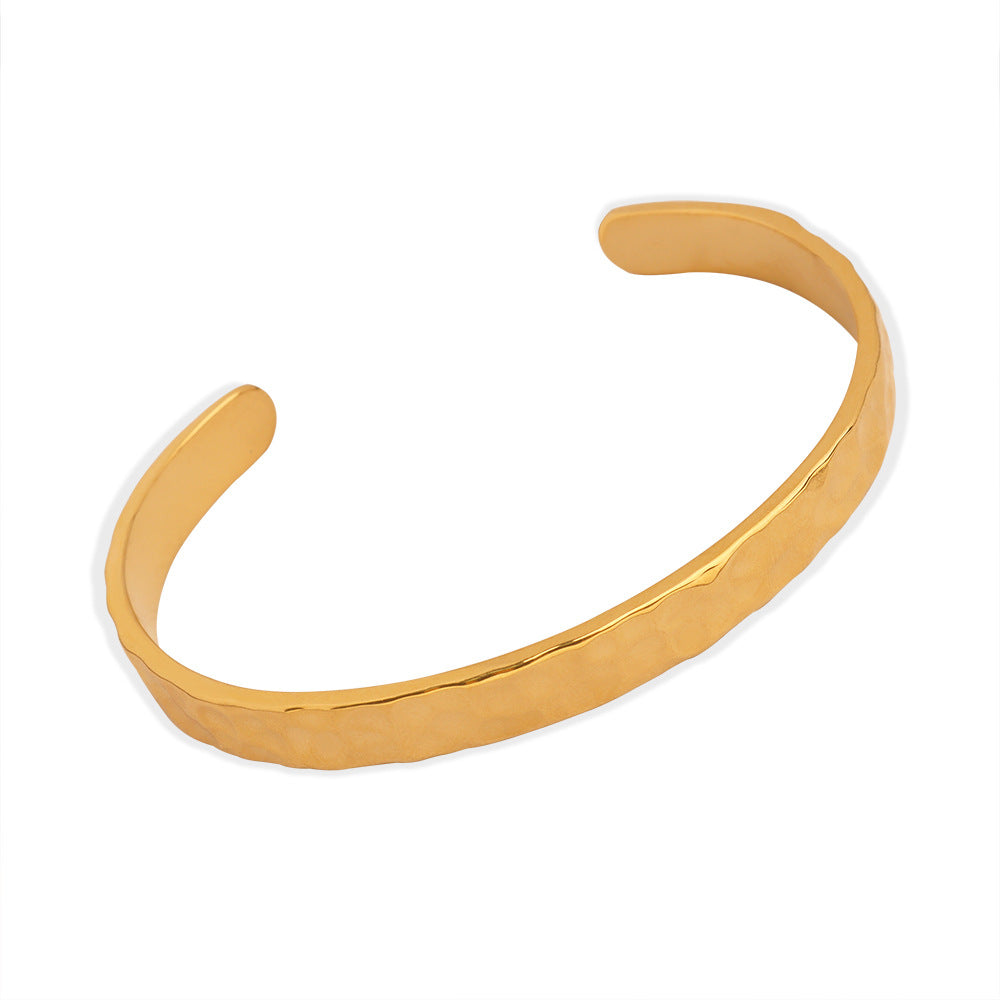 New simple personality niche design titanium steel gold-plated irregular bump hammer face opening bracelet women's jewelry wholesale