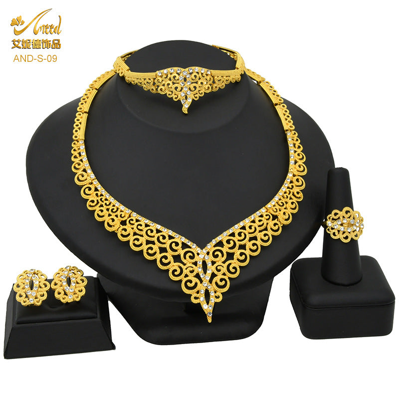 24K Gold Dubai Explosions Bride Four-piece Flower Rhinestone Jewelry Alloy Necklace Bracelet Earrings Ring